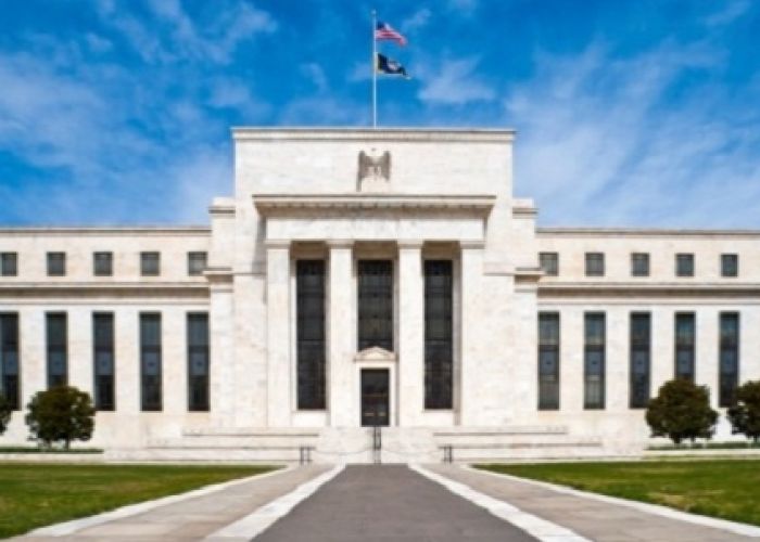 La actividad económica está expandiéndose a un paso moderado, dijo la Fed.